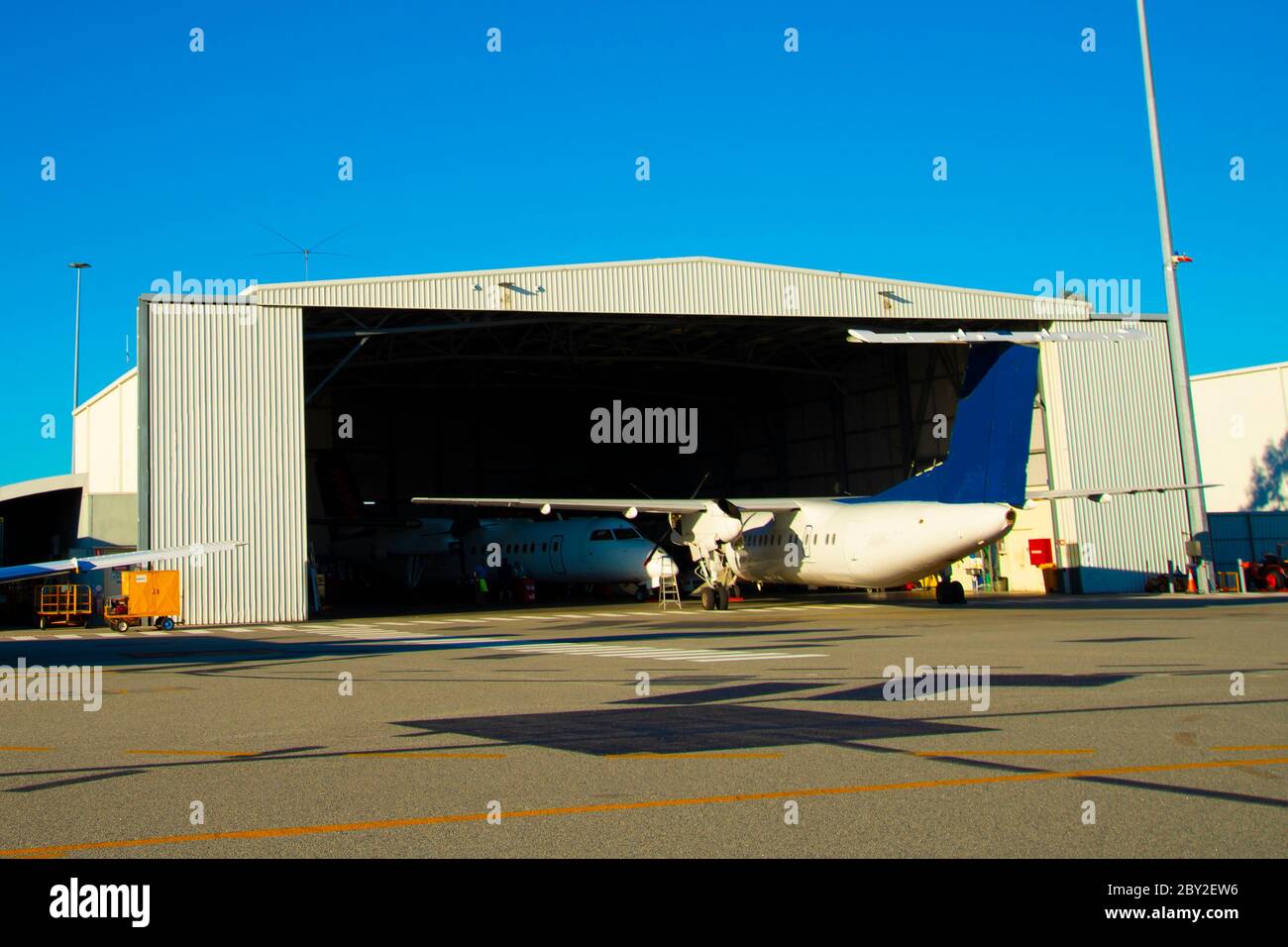 Industrial Airport Hangar for Maintenance Stock Photo