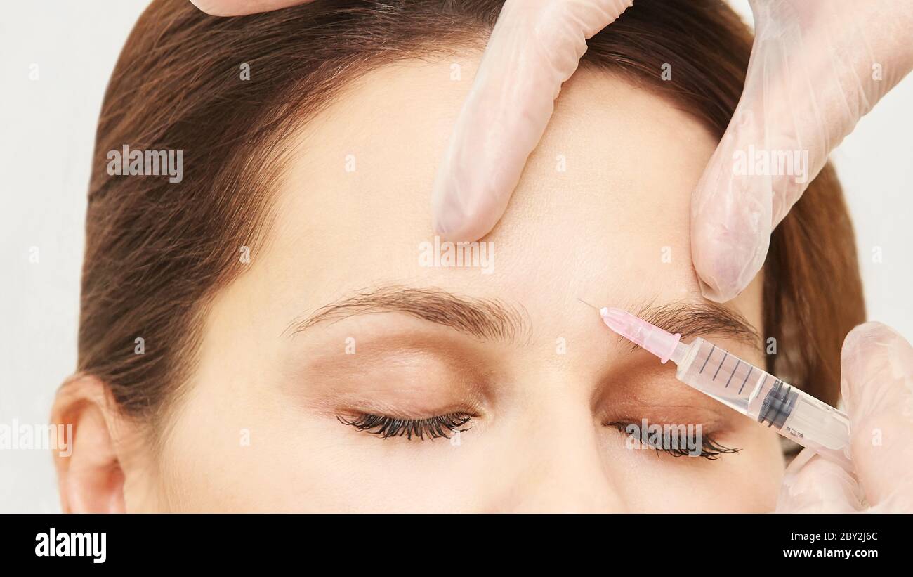 Prp plasma treatment. Facial rich cosmetology injecting. Woman, doctor hand Stock Photo