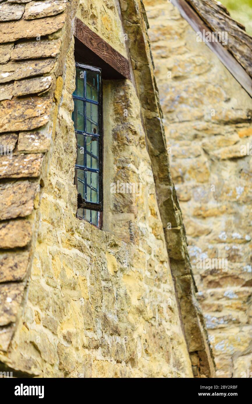 Old building window on stone wall background, architecture detail Stock ...