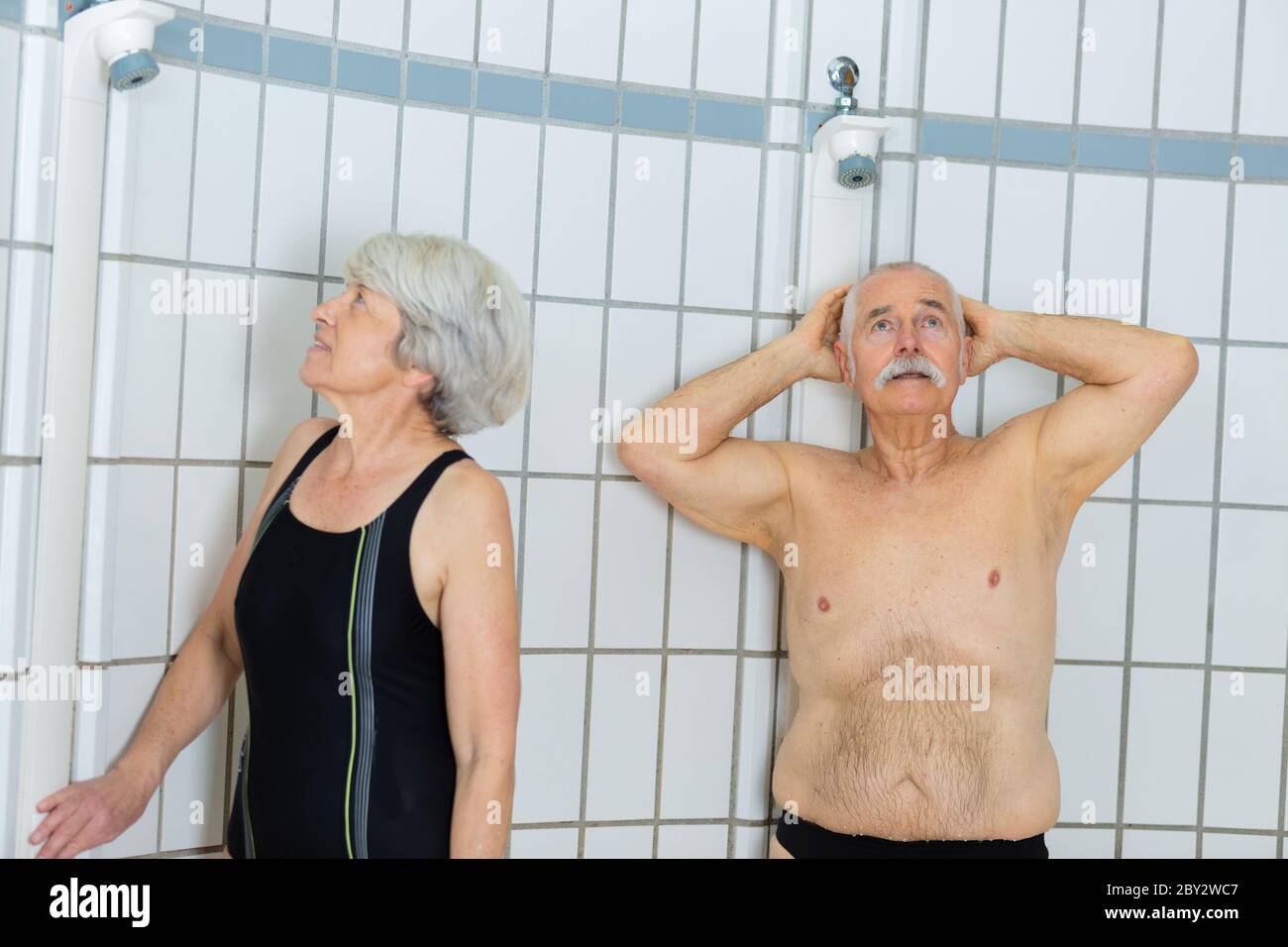 senior couple happy to take a shower after swimming Stock Photo Alamy