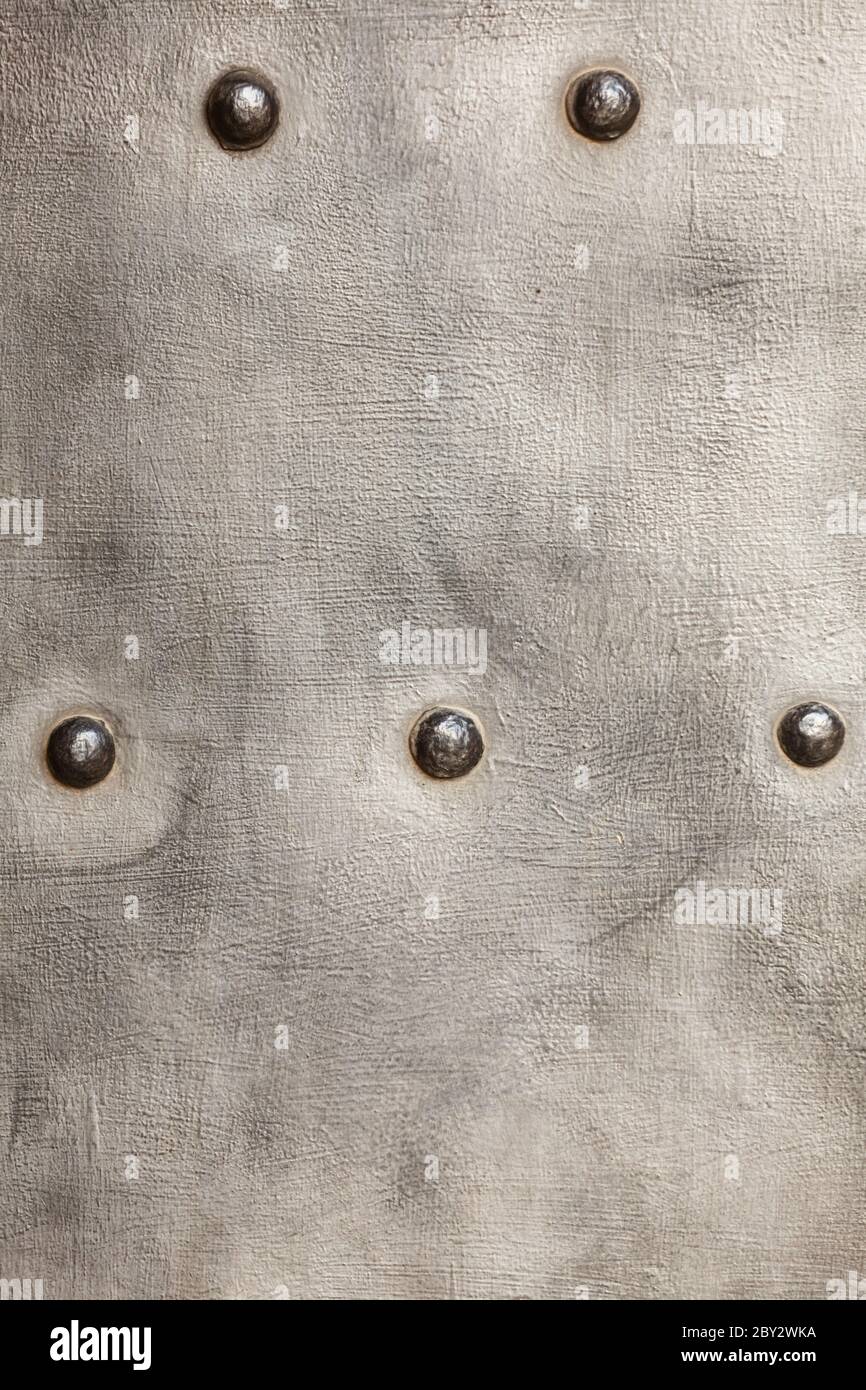 grunge metal plate or armour texture with rivets as background Stock ...