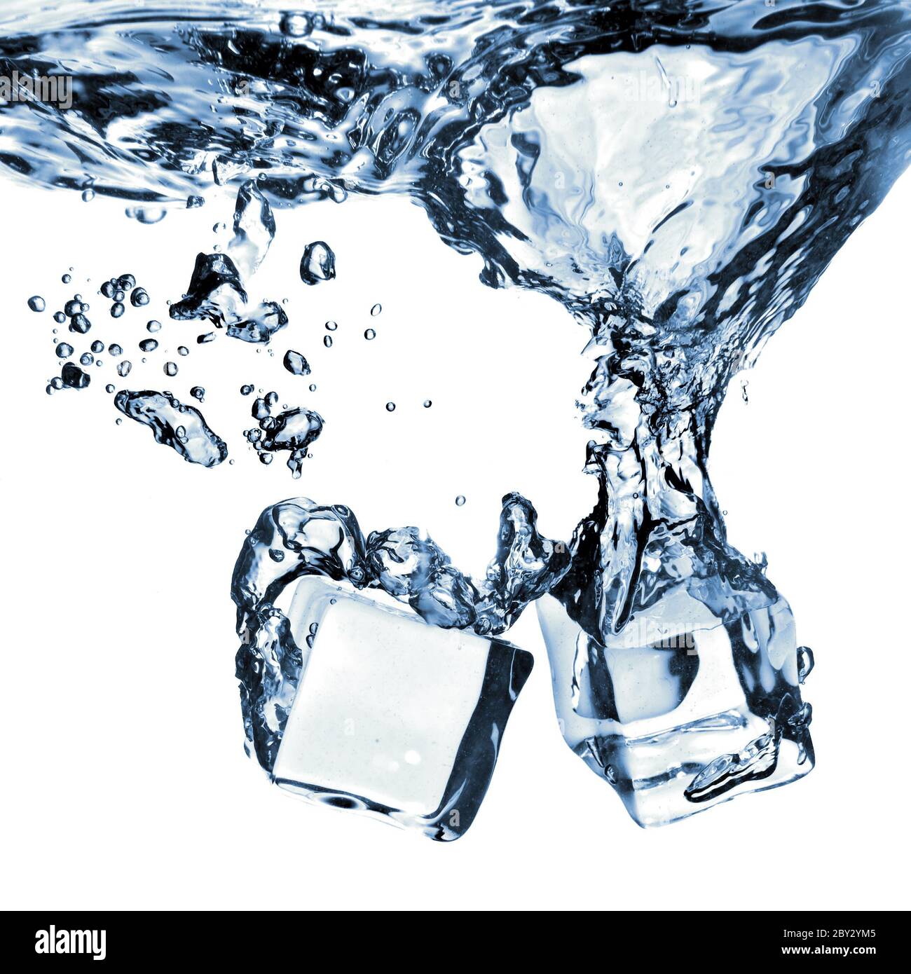 ice cubes dropped into water with splash isolated on white Stock Photo ...