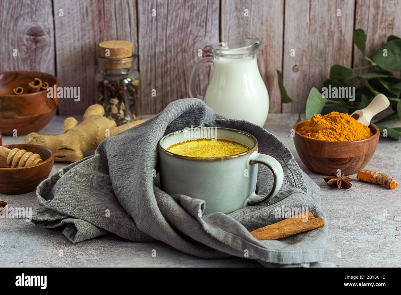 Golden turmeric milk with ingredients Stock Photo Alamy