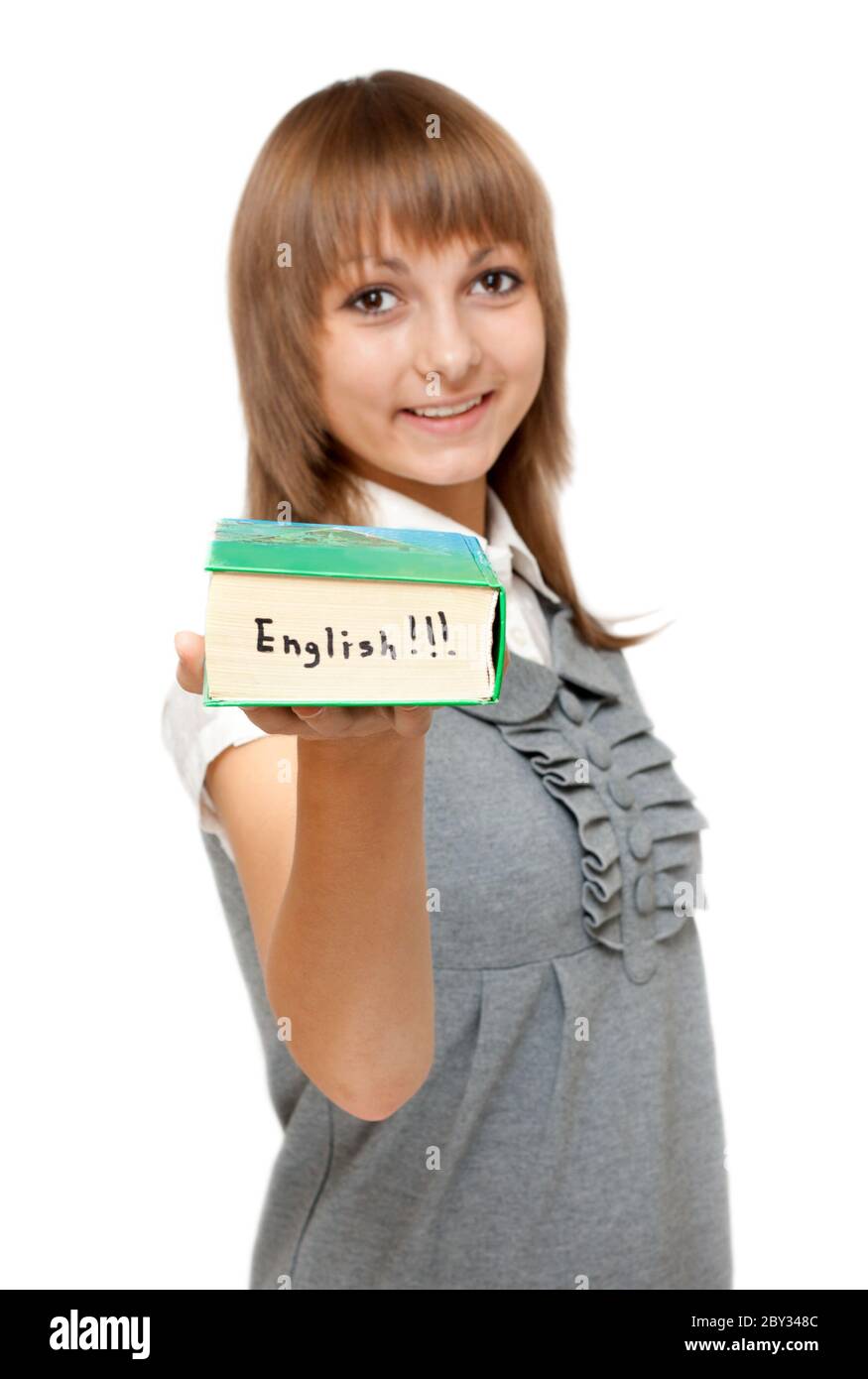 Young girl with dictionary english Stock Photo Alamy