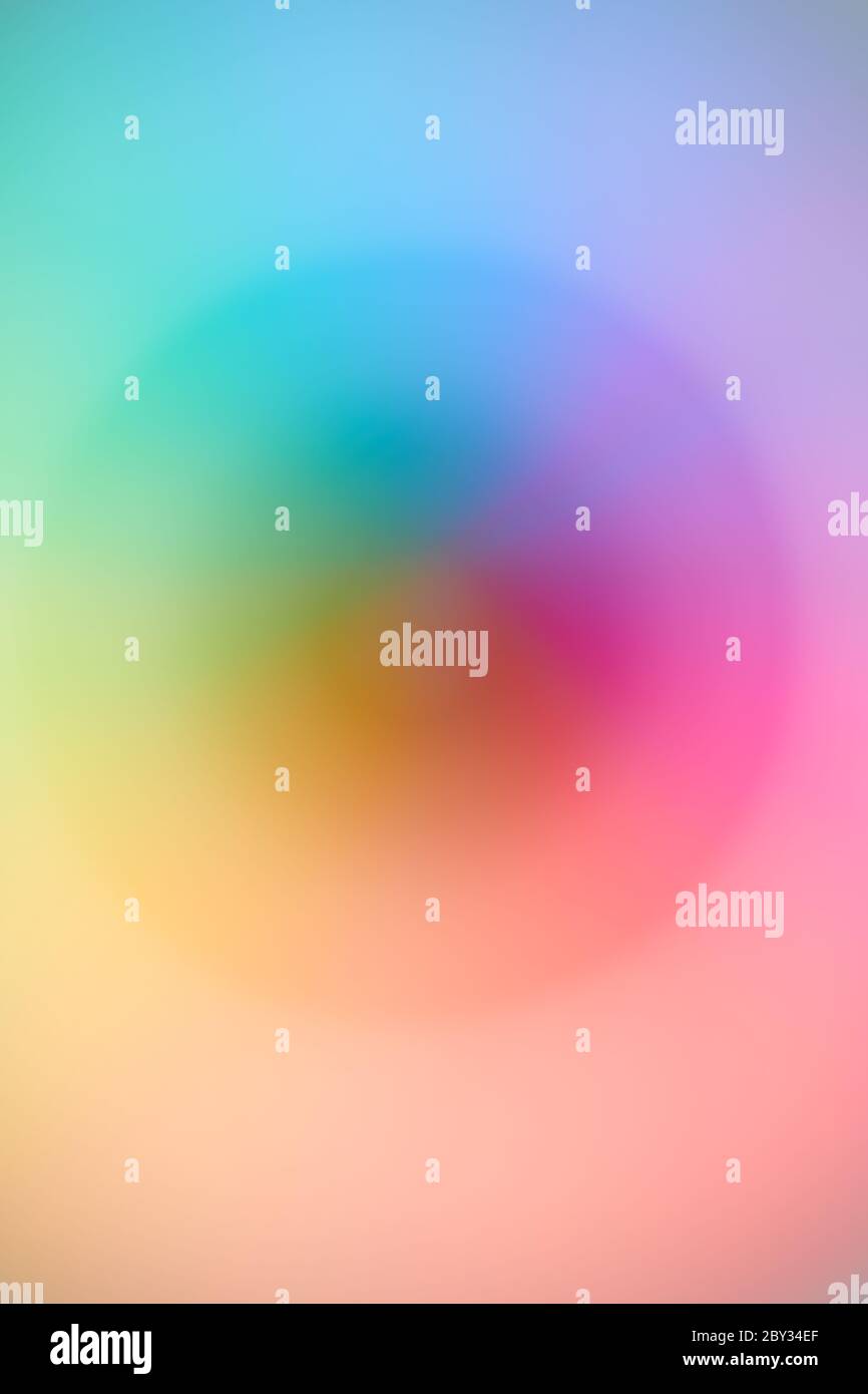 Blurred, soft and variegated colors of a rainbow, suitable for a background. Stock Photo