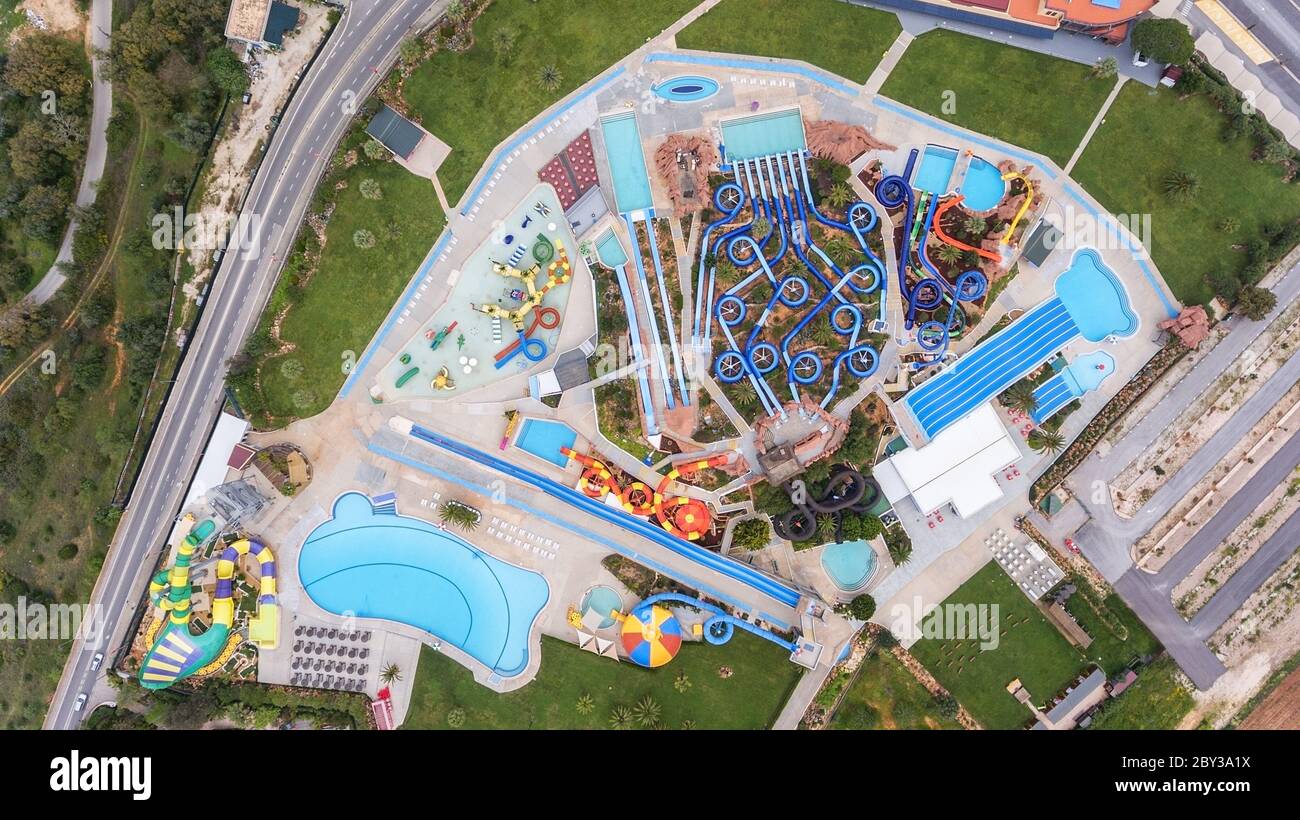Aerial view of aquapark from above. The pools are filled with water. Close-up. Stock Photo