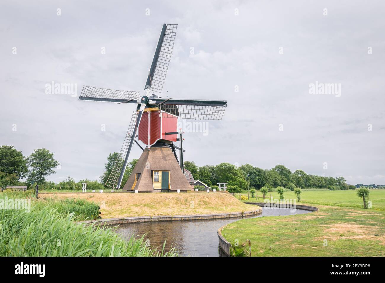 Classic dutch windmill in western part of Holland. Windmill is called 'Lagenwaardse Molen'. Stock Photo