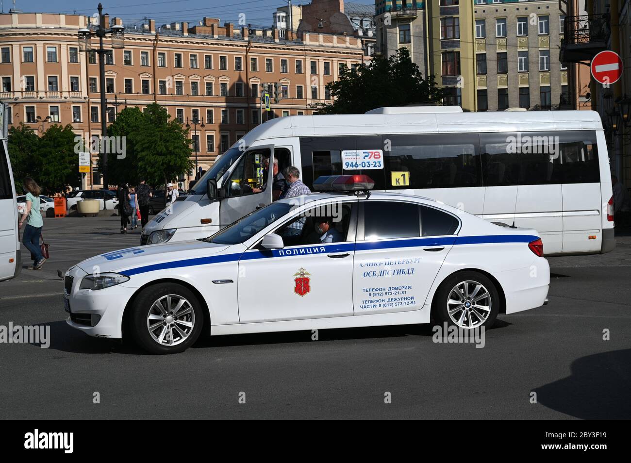 Policeman wearing protective coronavirus respiratory mask. Public transport check. Saint Petersburg, Russia Stock Photo