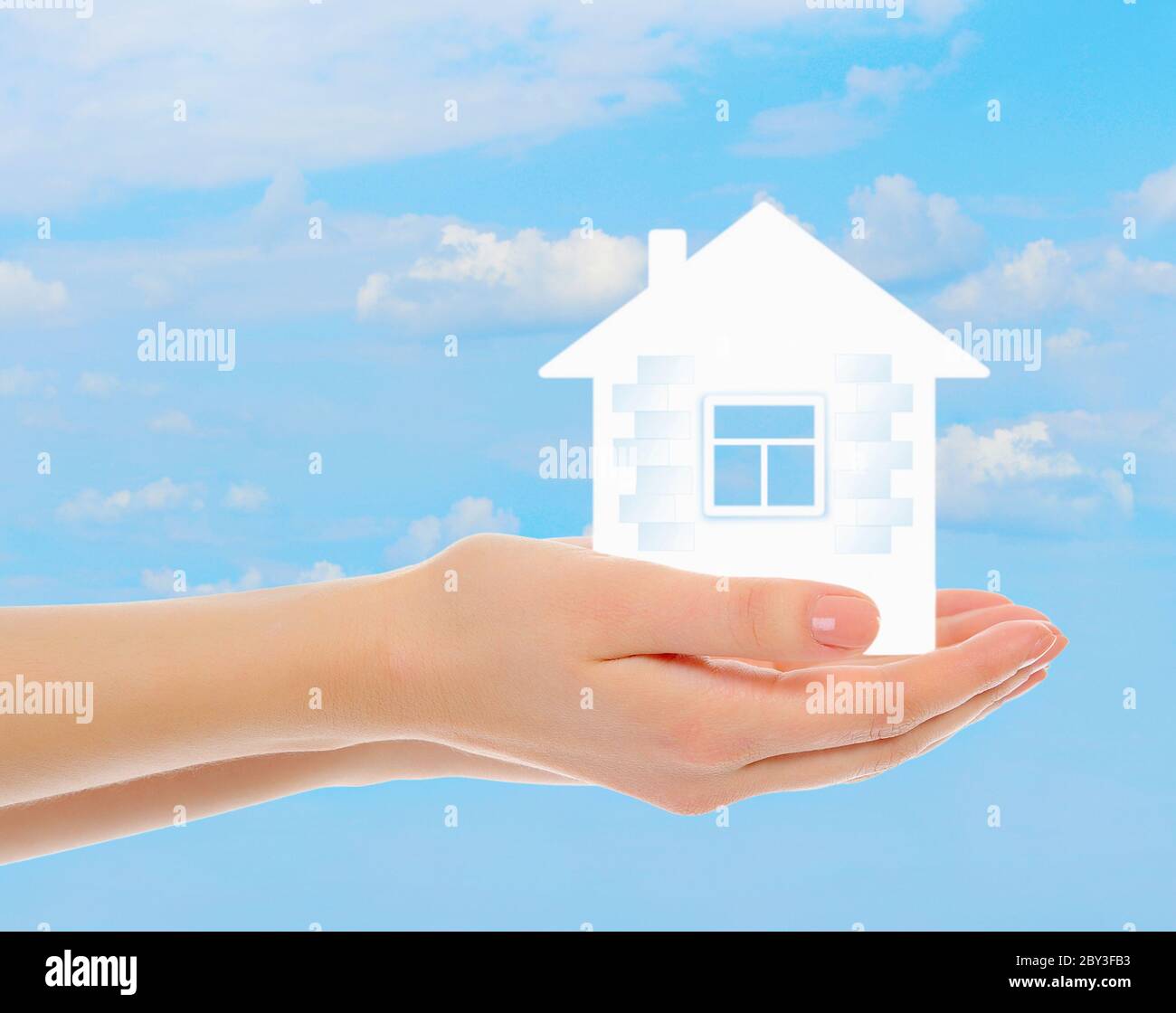 house in human hands Stock Photo