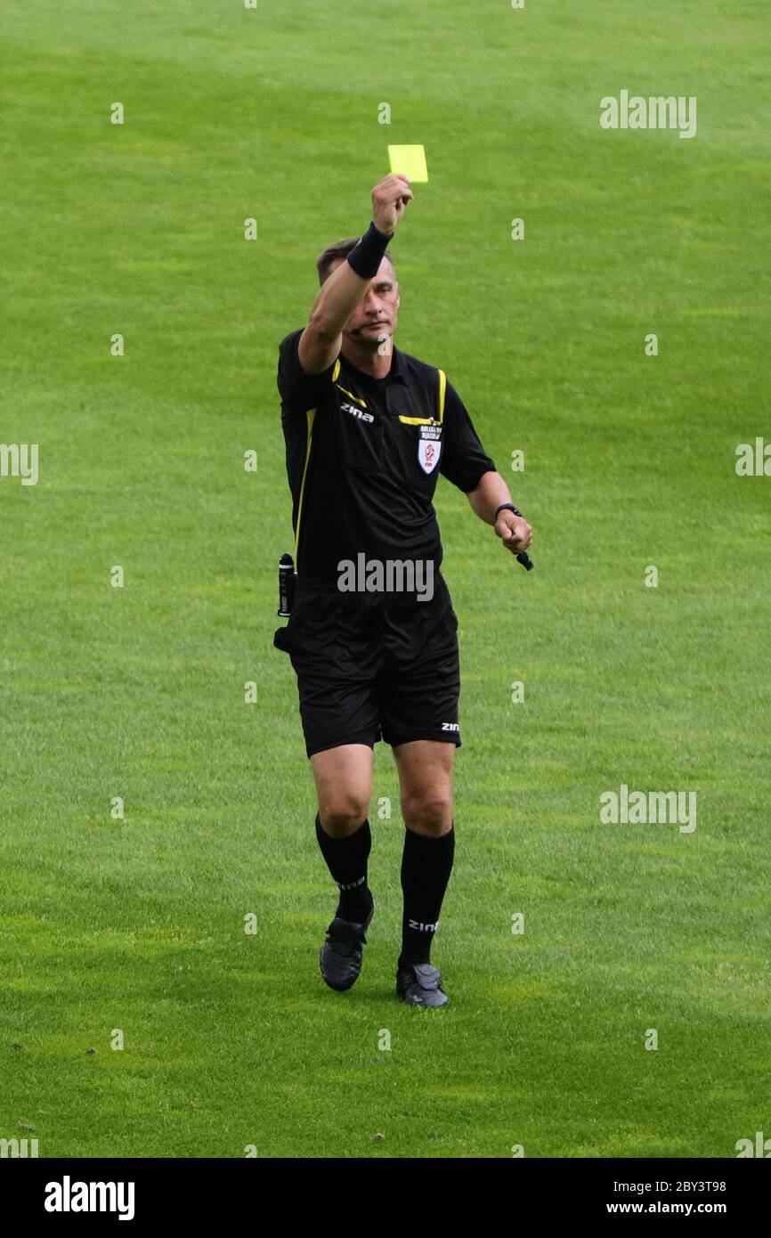 Krakow, Poland. 07th June, 2020. A referee shows a yellow card during