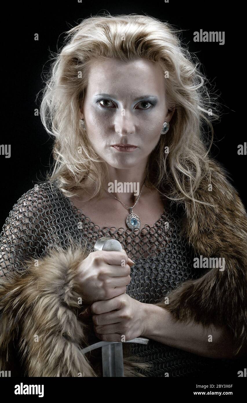 Viking girl with sword Stock Photo