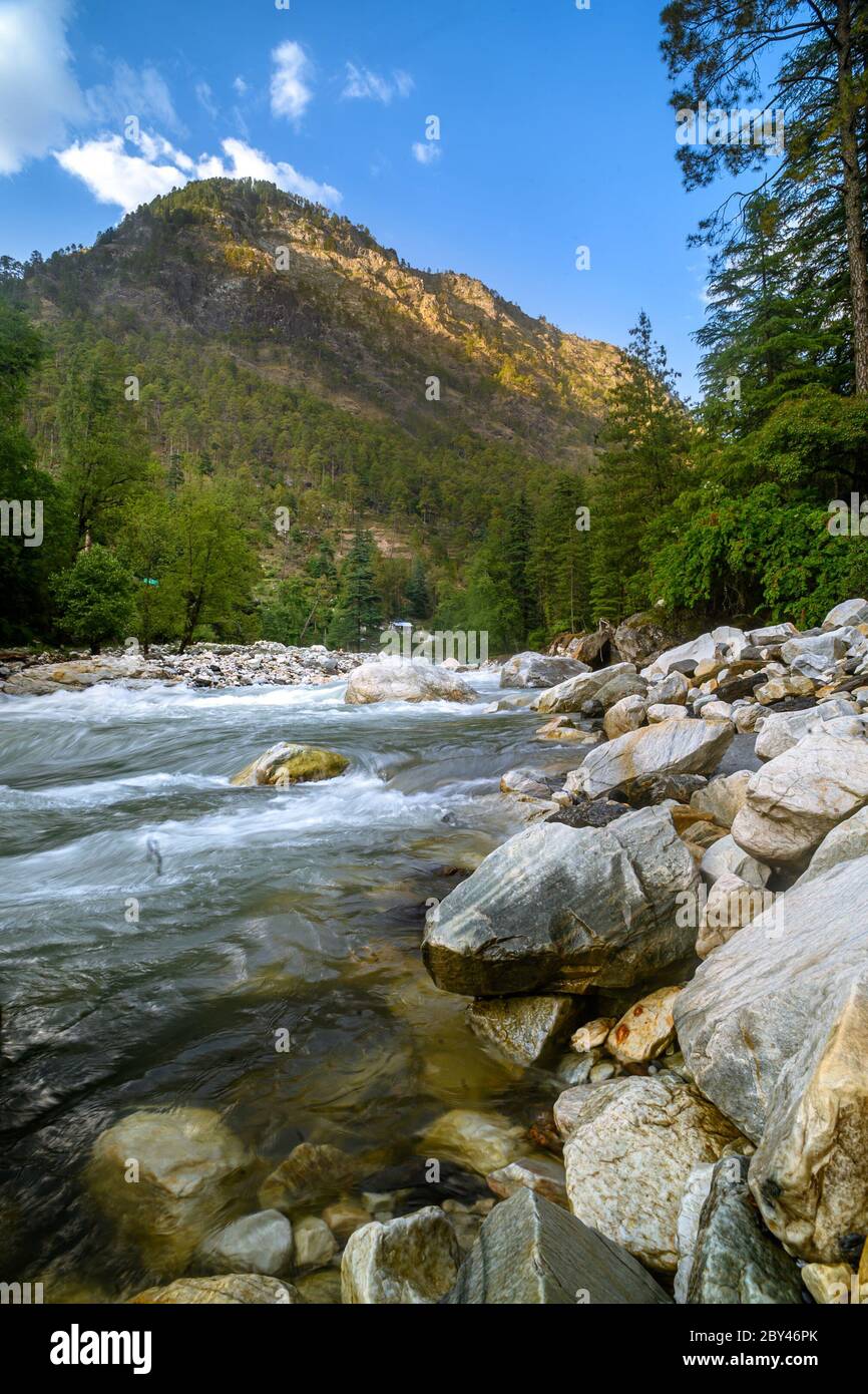 Parvati River flows through the forest with strong currents, Kasol, Himachal Pradesh India. Stock Photo