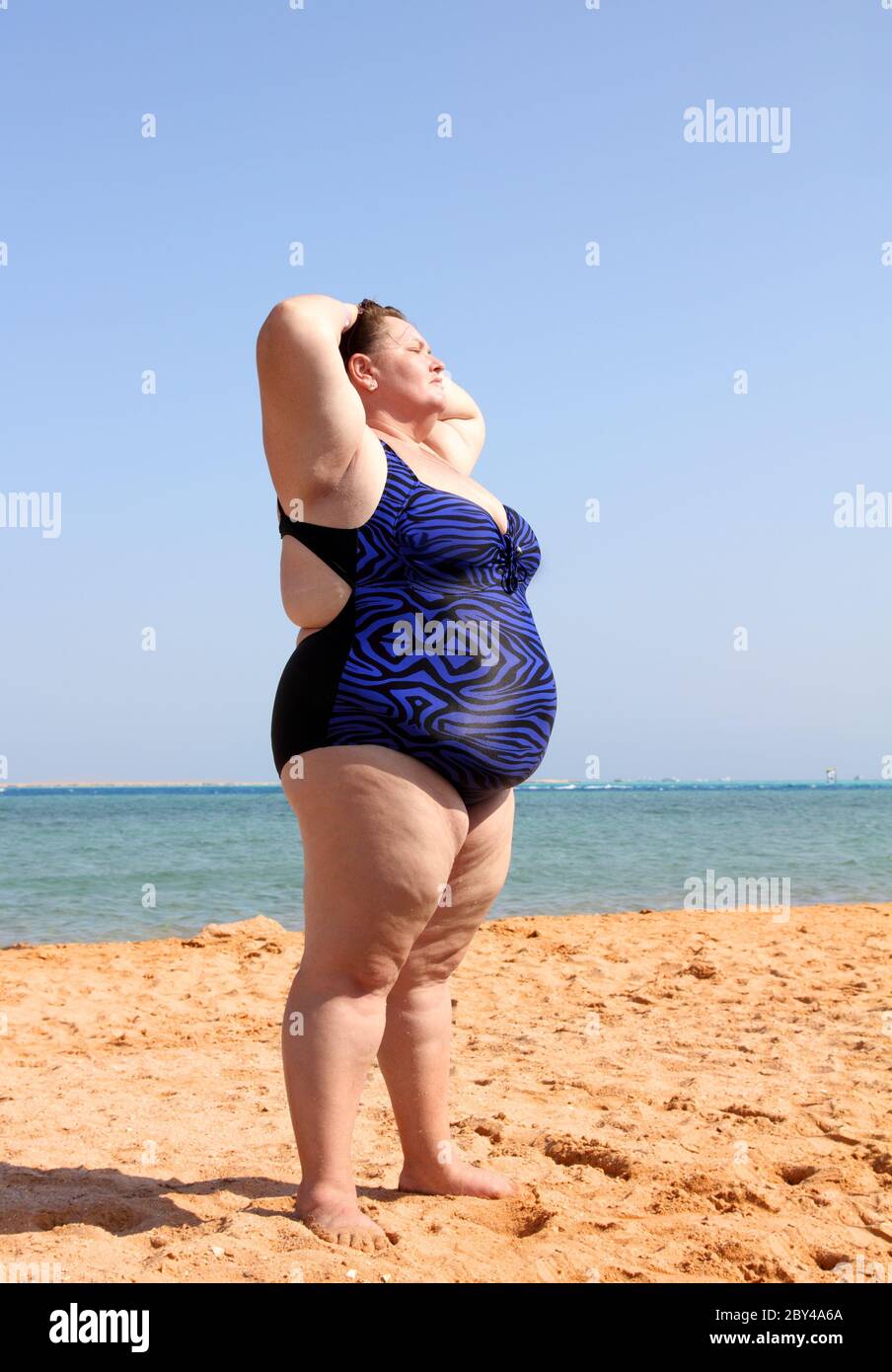 Fat woman on beach (96) фото