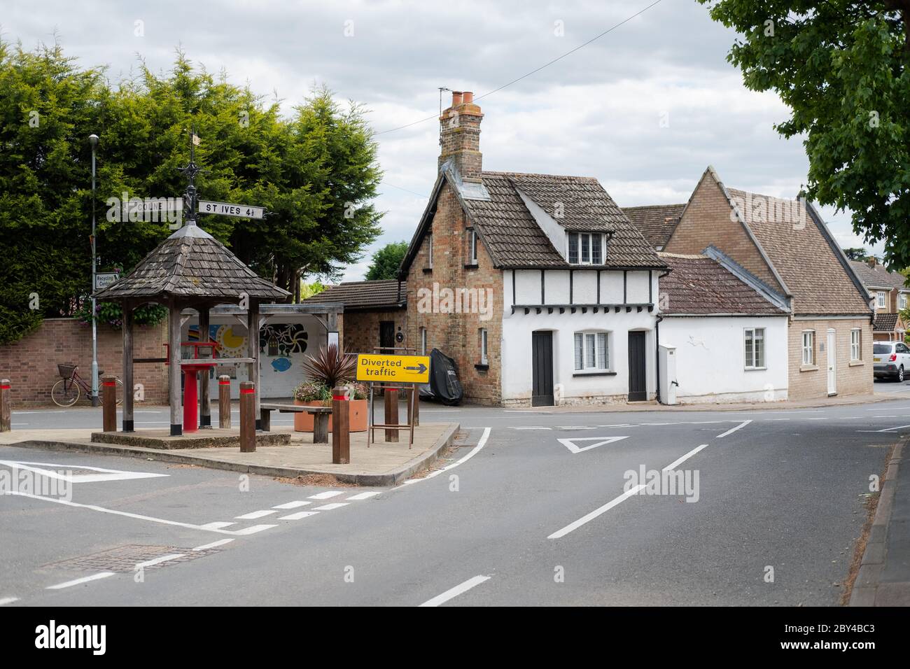 Detailed view of an old crossroads seen in a typical British village, showing old and new