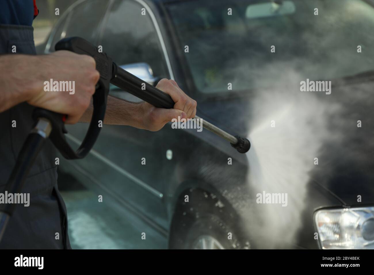 A man washes a car. Clear car concept Stock Photo