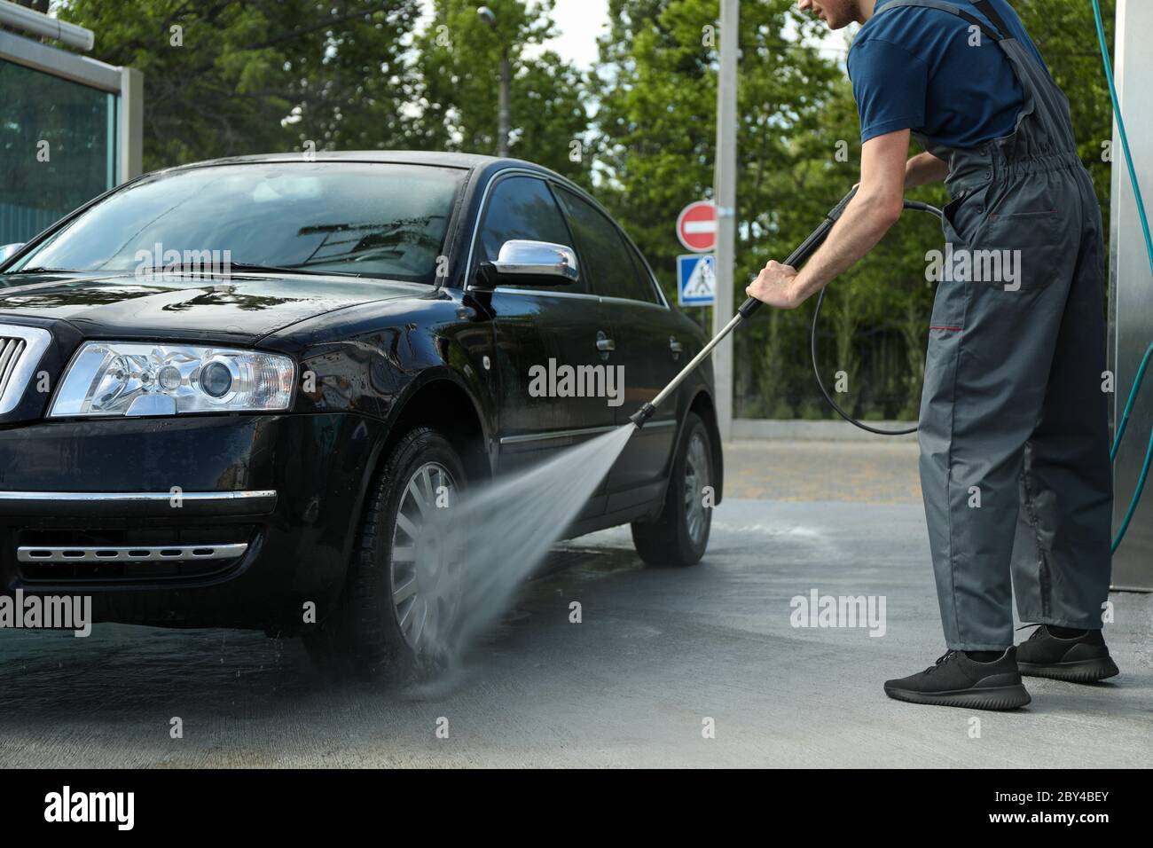 A man washes a car. Clear car concept Stock Photo