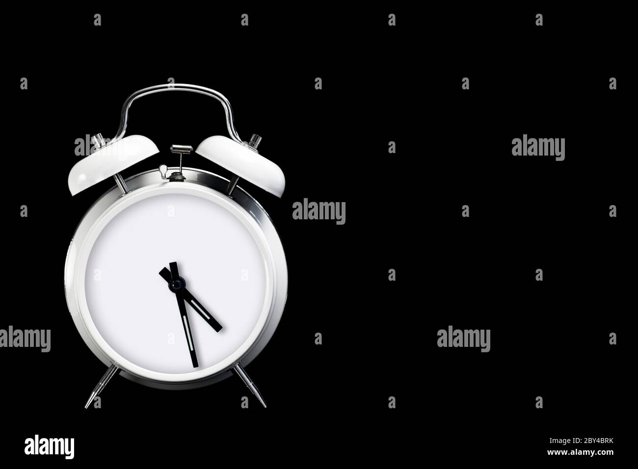 alarm clock without numbers isolated on black background with copy space Stock Photo