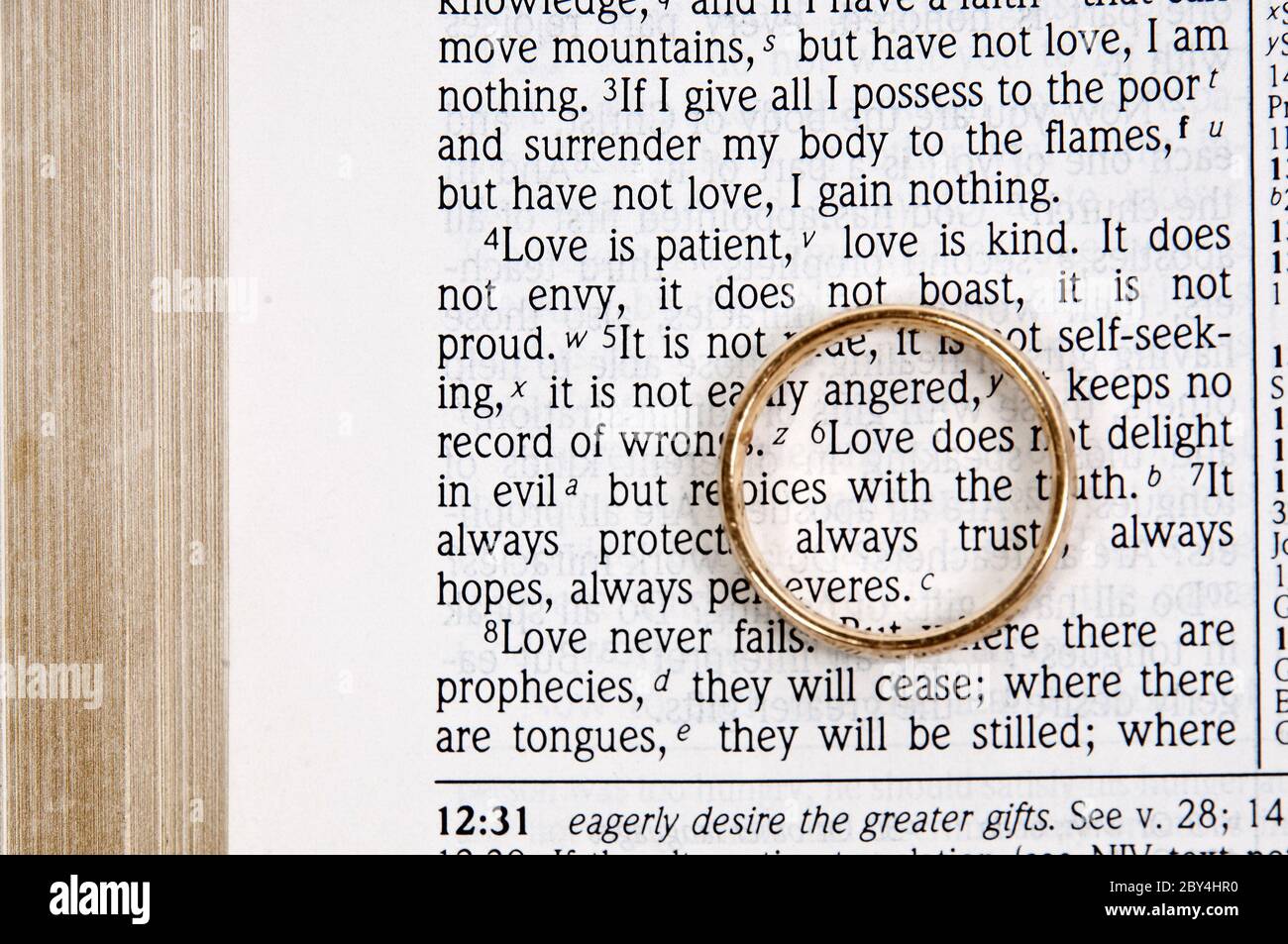Wedding Ring on a Bible Stock Photo Alamy