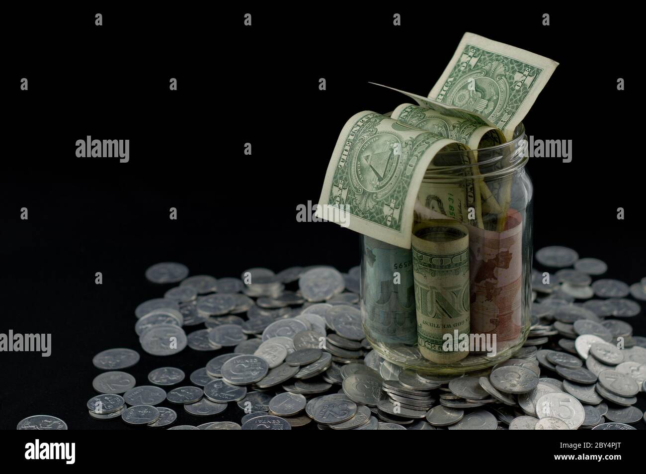 Bank notes in the jar. Dollar, Euro, Zlot Stock Photo - Alamy