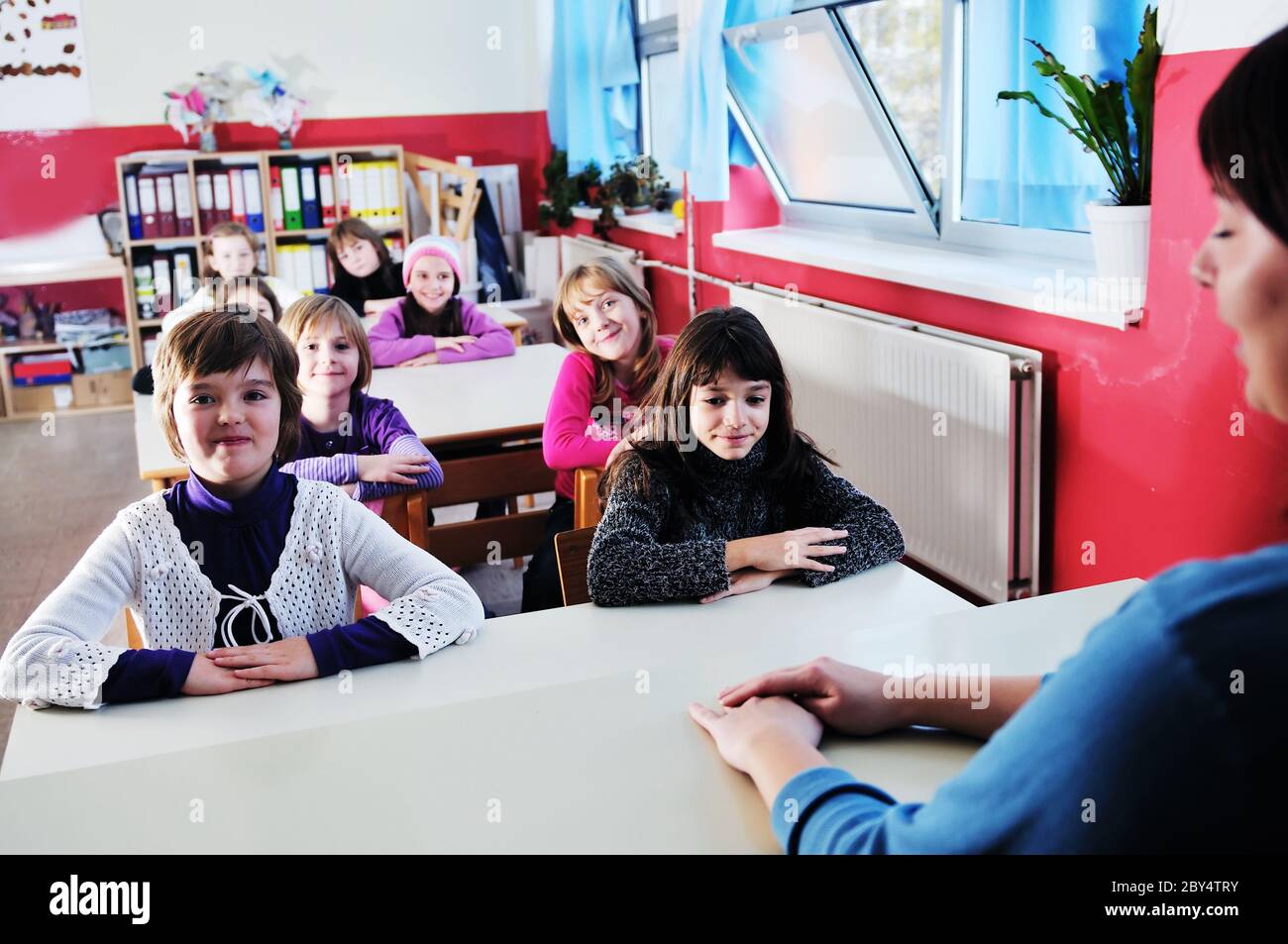 happy teacher in school classroom Stock Photo - Alamy