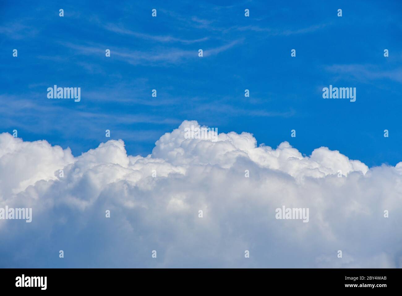 Blue sky with big white clouds Stock Photo - Alamy