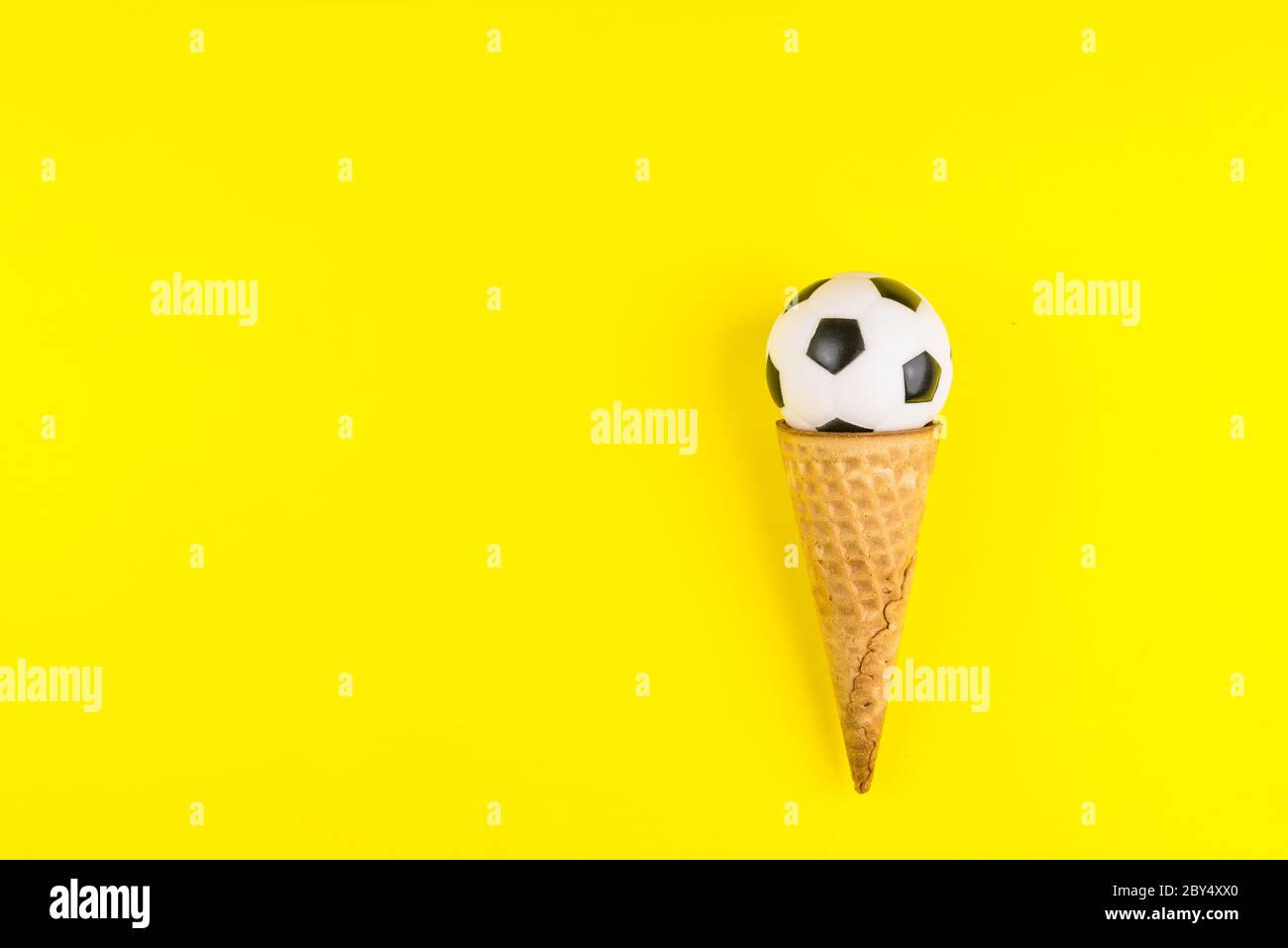 Download Soccer Or Football Ball In Ice Cream Waffle Cone On Yellow Background In Minimal Style Concept Sports Entertainment Top View Copy Space Template For Stock Photo Alamy