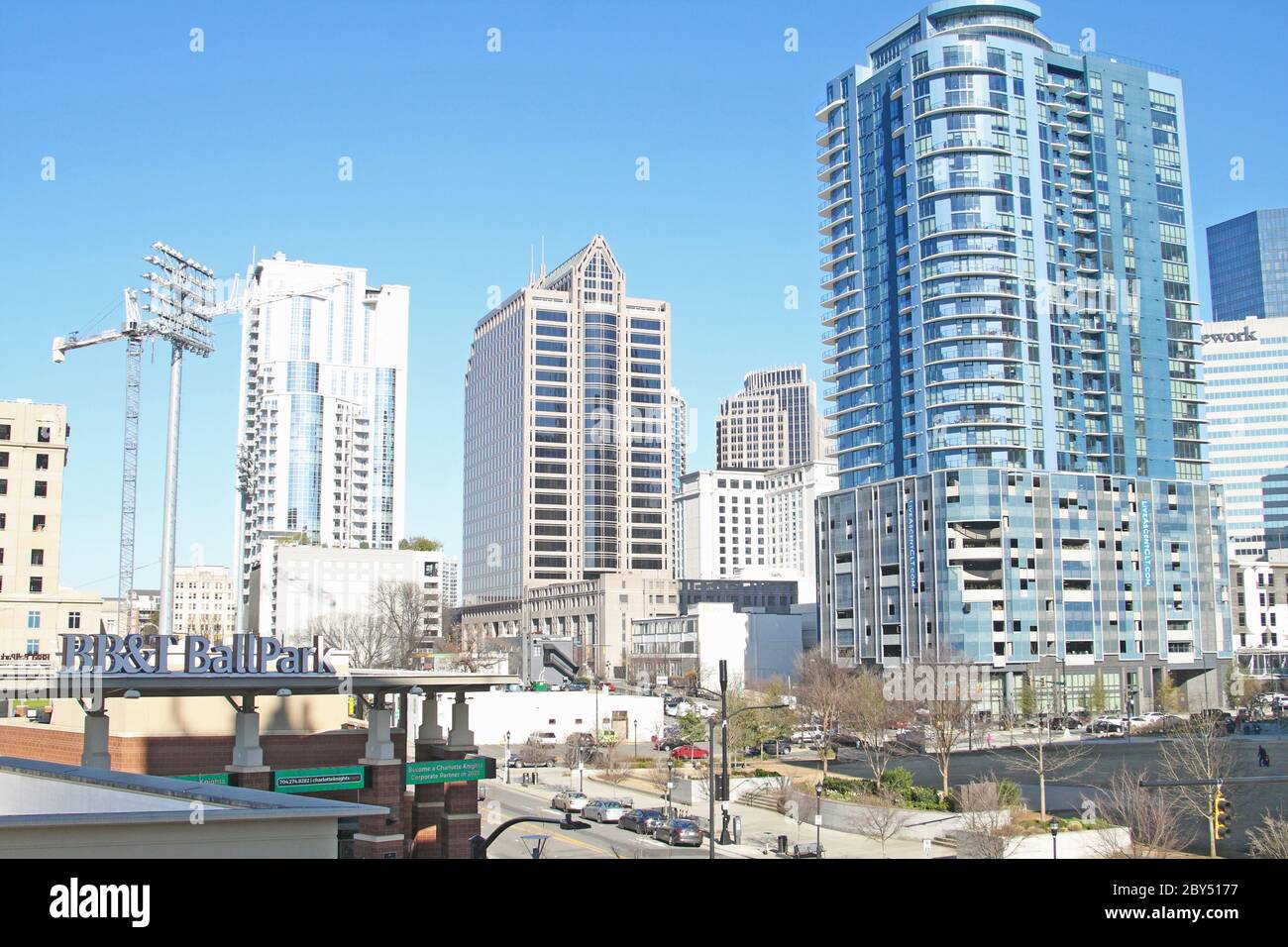 Skyscrapers of the Uptown central business district of Charlotte, North Carolina, USA. On the left is the BB&T Ballpark, home of the Charlotte Knights Stock Photo