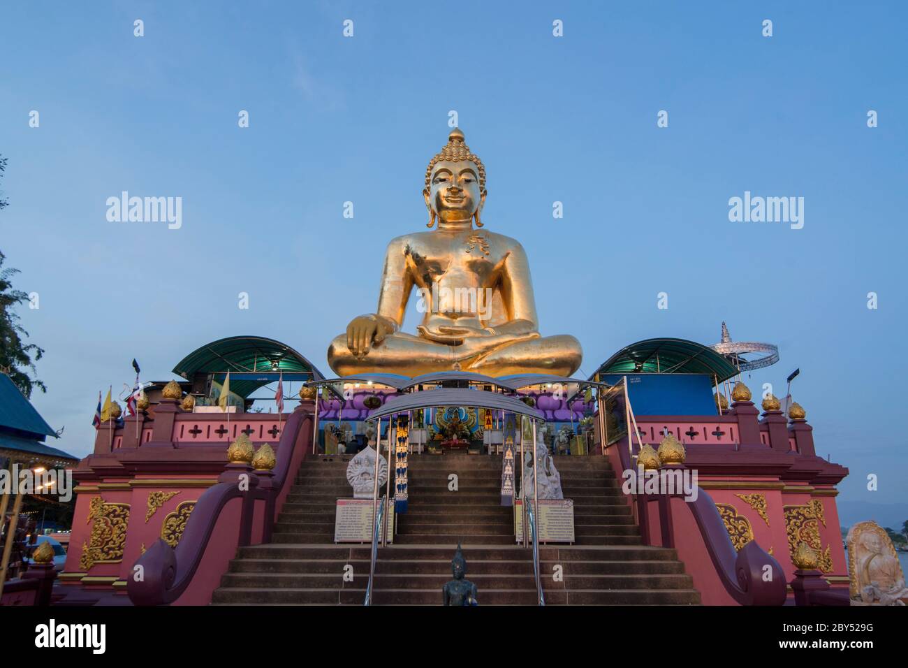 the Giant Buddha on the Dragon Boat Temple at the Mekong River in the town of Sop Ruak in the golden triangle in the north of the city Chiang Rai in N Stock Photo