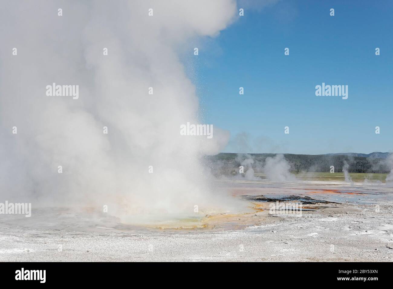 Hot spring emits water and steam at the Lower Geyser Basin, Yellowstone ...
