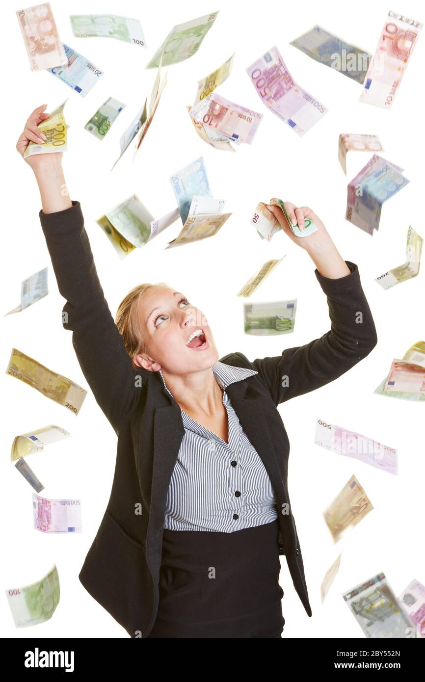 Happy young woman catches flying money from euro bills Stock Photo