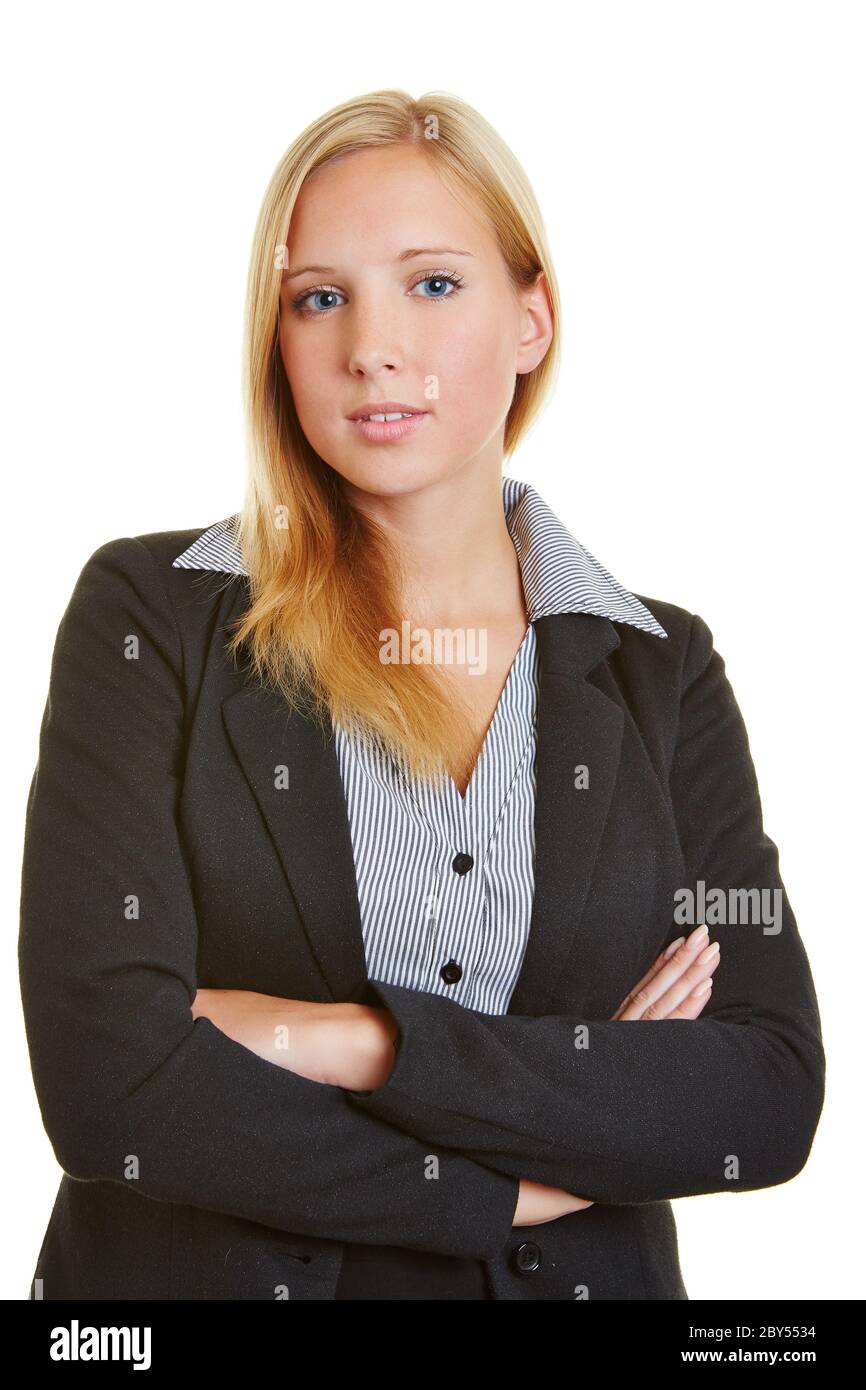 Blonde businesswoman with crossed arms looks serious Stock Photo