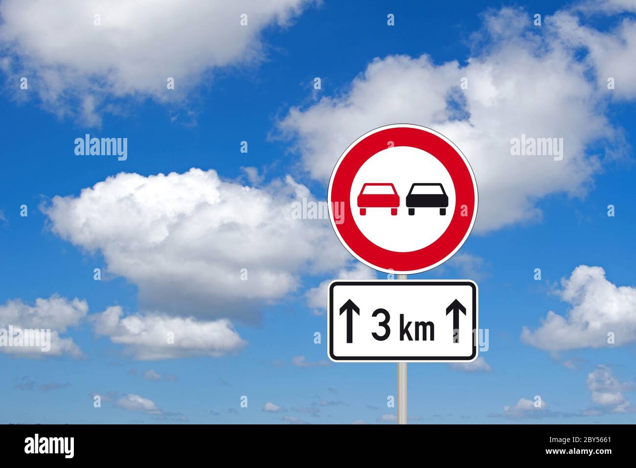 traffic sign Ueberholverbot, no passing nex 3 km, Germany Stock Photo