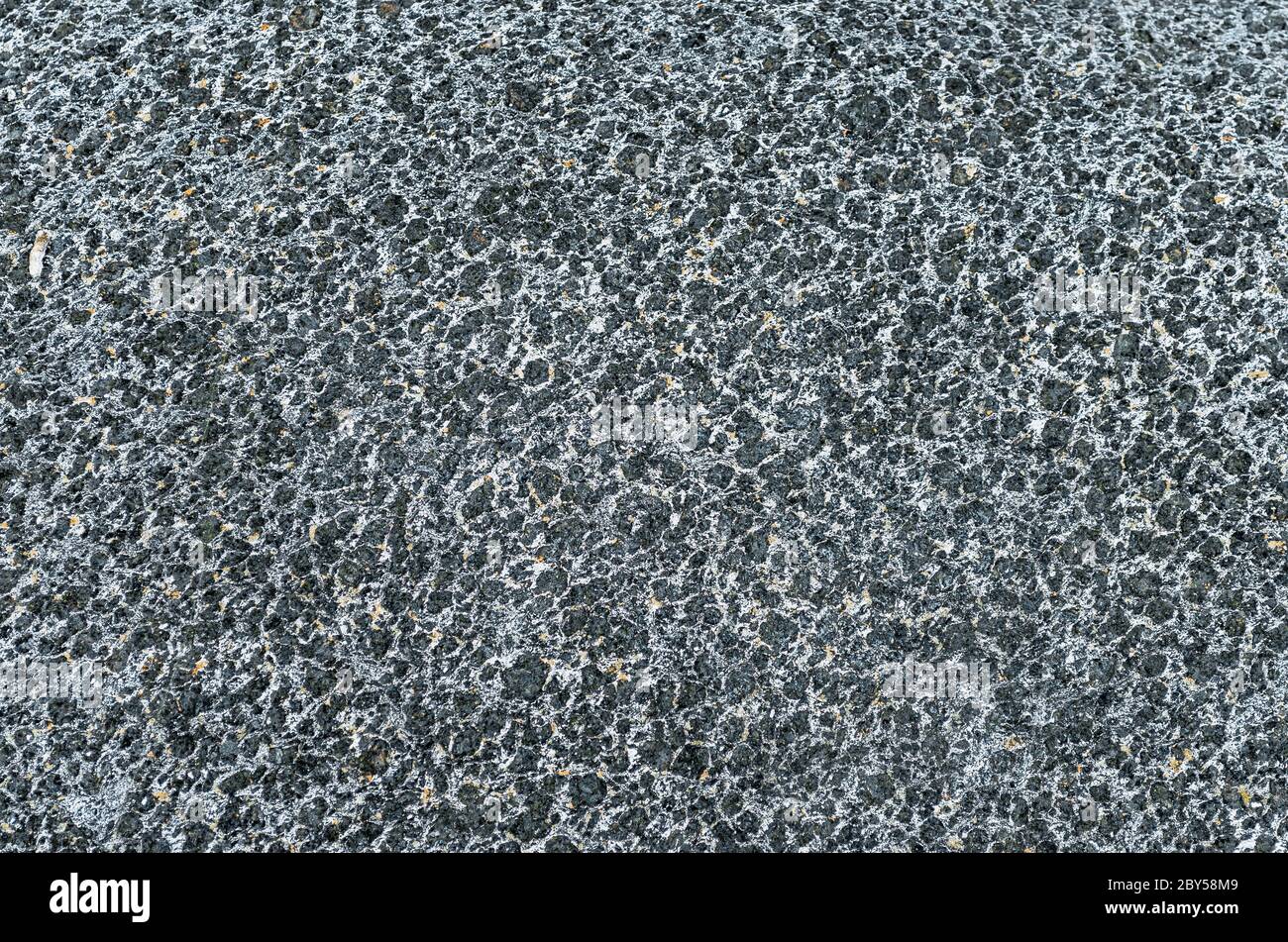 Granite texture dark dot speck a stone Stock Photo