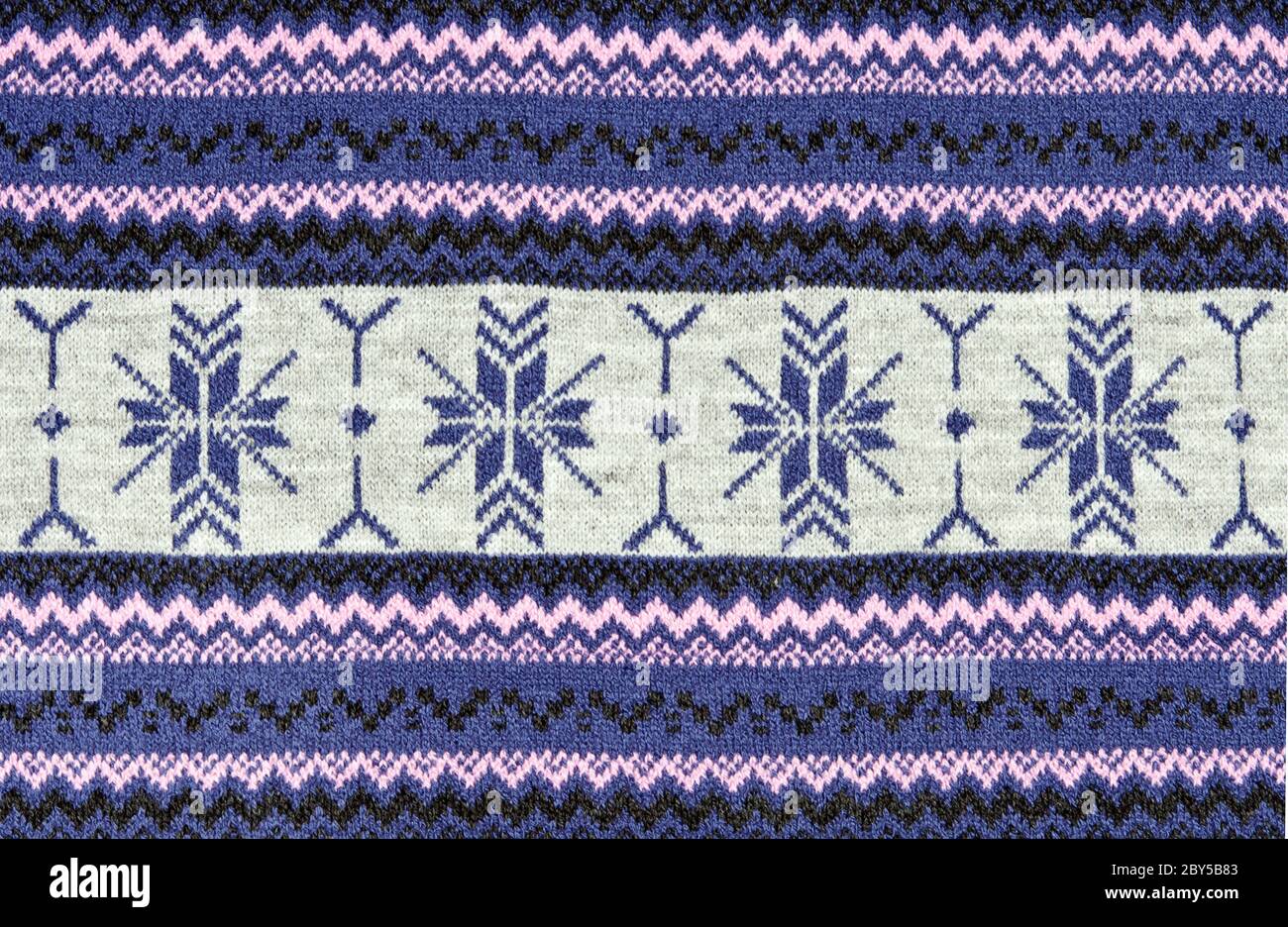 knitted blue background with a pattern Stock Photo - Alamy