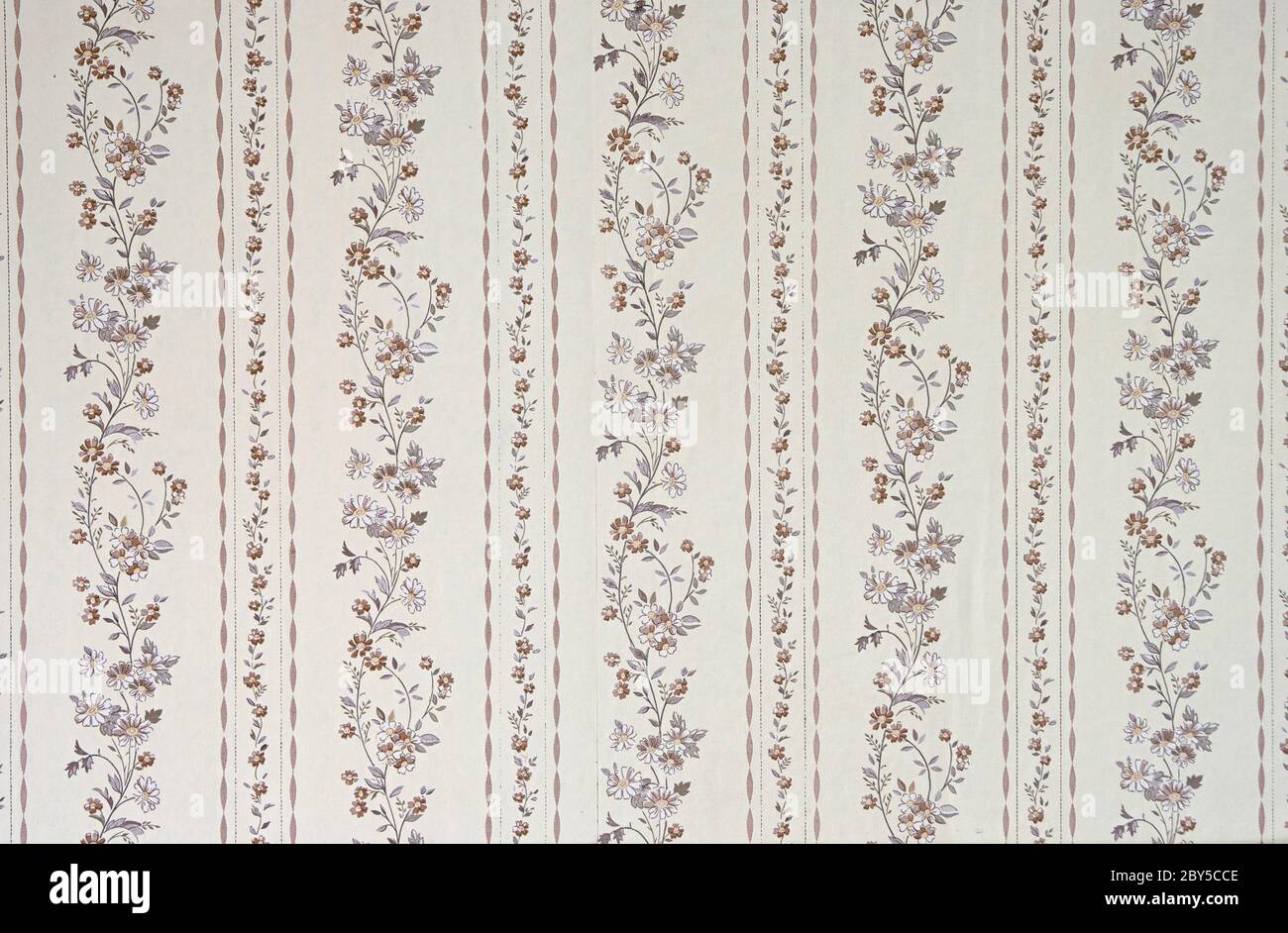 Old beige wallpaper for texture or background Stock Photo