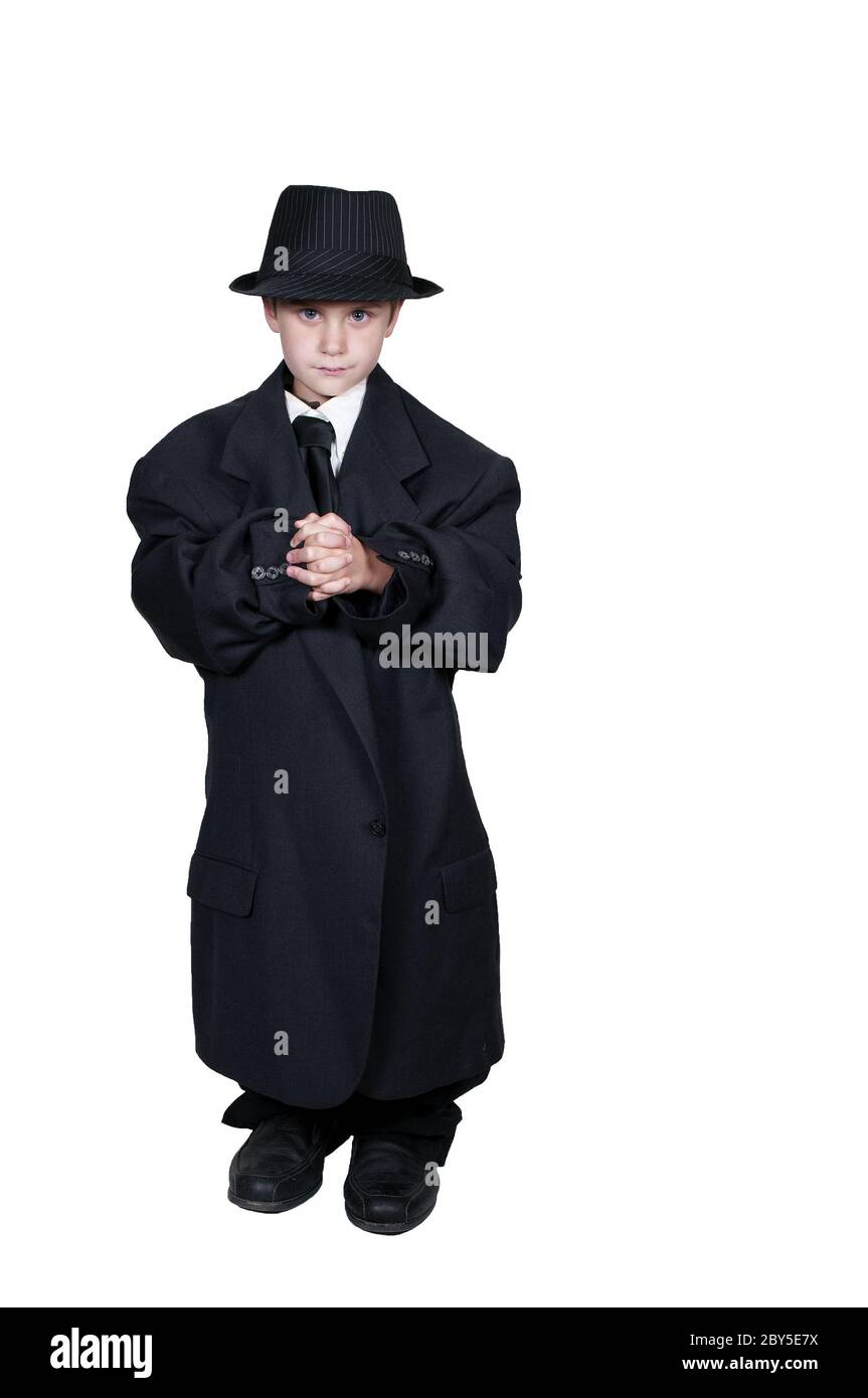 Boy in Oversized Clothes Stock Photo