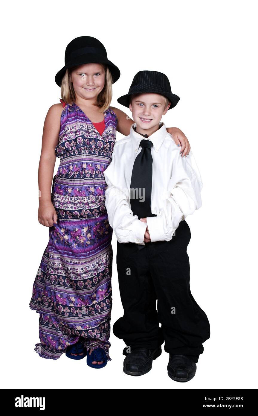 Boy and Girl in Oversized Clothes Stock Photo