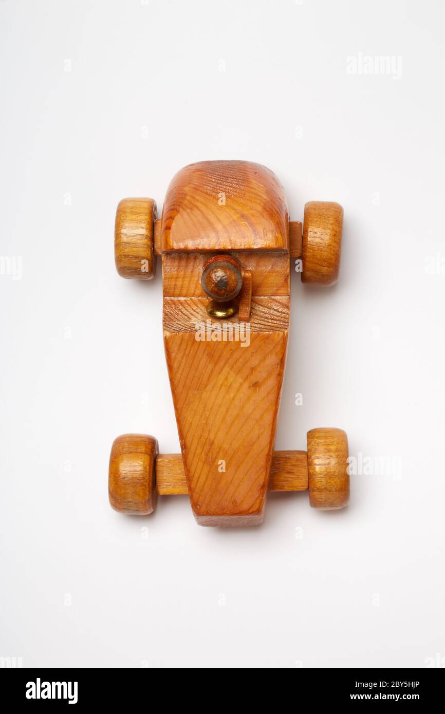 Photograph of a handmade wooden toy car with driver Stock Photo - Alamy