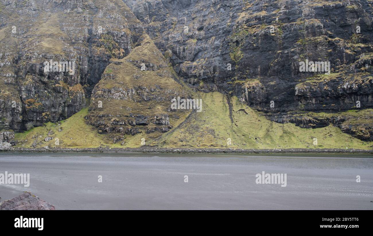 classic-faroe-islands-scenery-with-towering-cliffs-islands-mountains