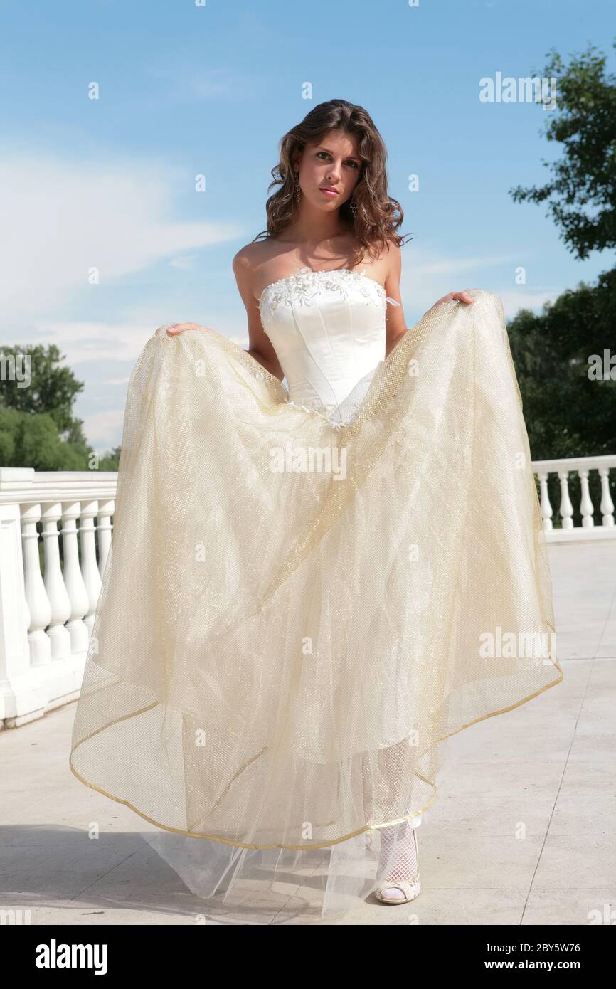 white and golden gown