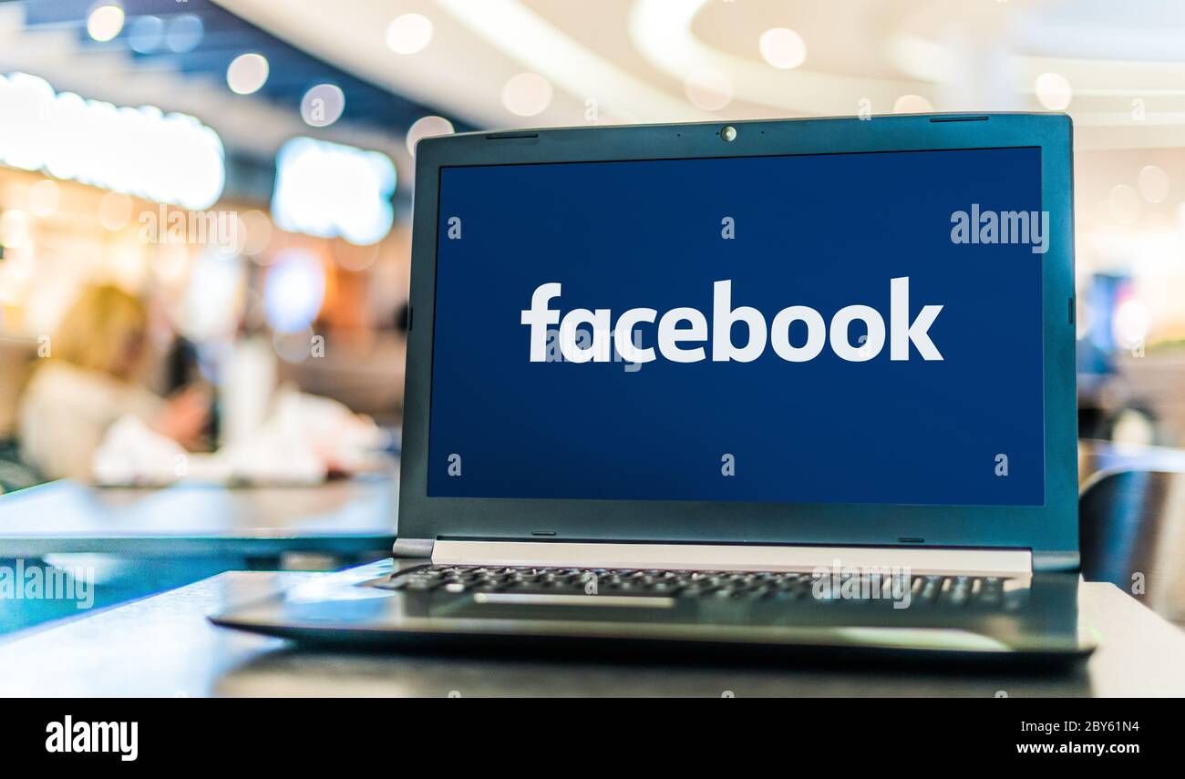 POZNAN, POL - APR 28, 2020: Laptop computer displaying logo of Facebook ...