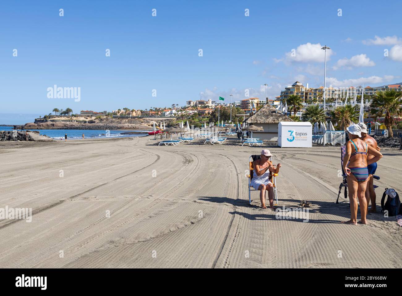 Costa Adeje, Tenerife, Canary Islands, Spain. 9 June 2020. Locals enjoying the open beaches. Usually packed with tourists now only residents are on the island due to Covid 19, Corona virus state of Emergency, now in Phase 3 of de-escalation and hopefully ready to accept international tourism from 1st July. Stock Photo