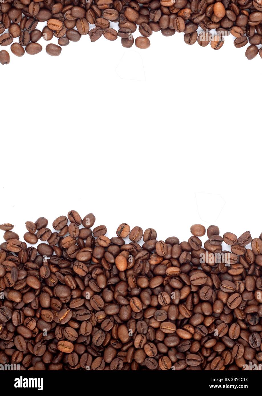 Brown roasted coffee beans isolated on white background Stock Photo - Alamy