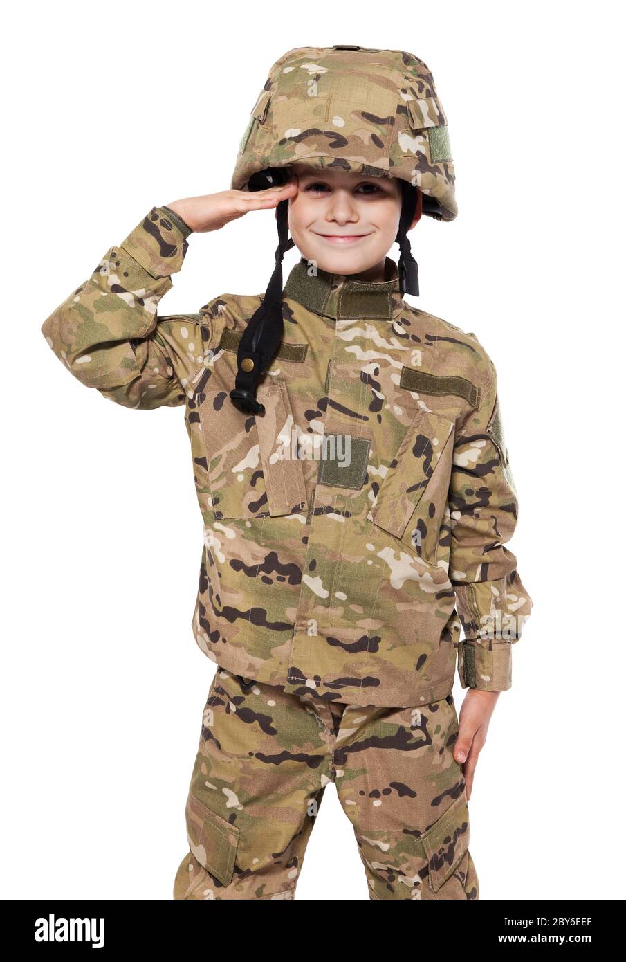 Saluting soldier. Young boy Stock Photo