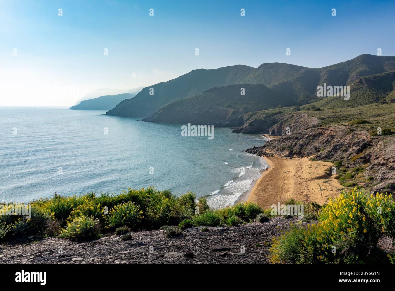 Green mountains and sandy beaches of regional park of Calblanque, Monte de  las Cenizas and Peña del Aguila in Spain Stock Photo - Alamy