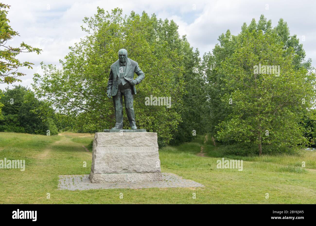 Winston Churchill Bronze Statue on plinth in Woodford Green, wide angle photo. Essex, England Stock Photo