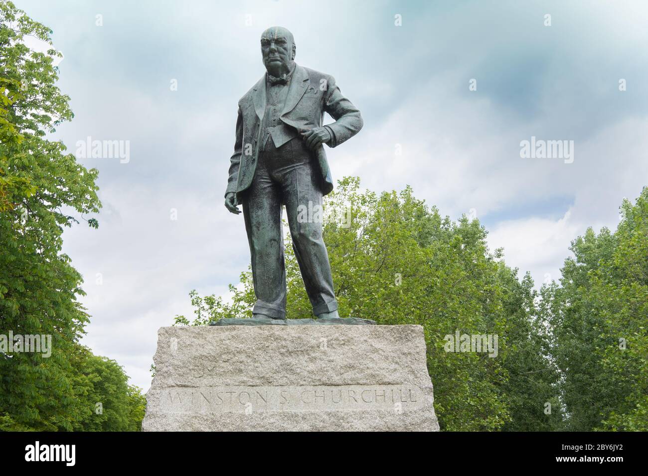 Winston Churchill Bronze Statue on plinth in Woodford Green, photo looking up from plinth. Essex, England Stock Photo