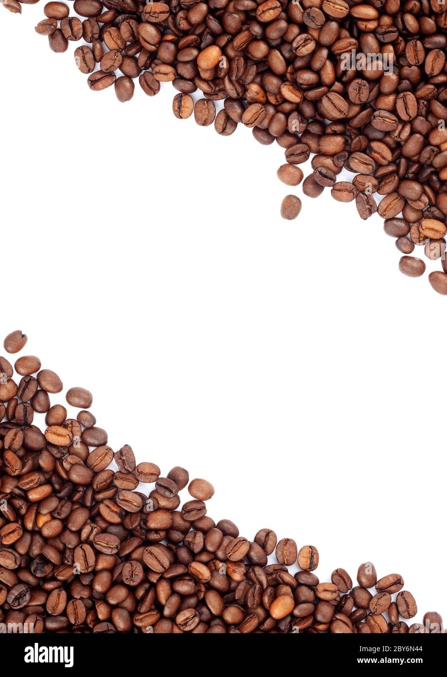Brown roasted coffee beans isolated on white background Stock Photo - Alamy