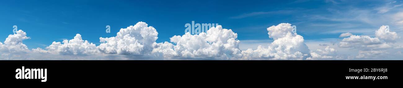 White fluffy clouds on blue sky. Soft touch feeling like cotton. White puffy clouds cape with space for text. Beauty in nature. Close-up white cumulus Stock Photo