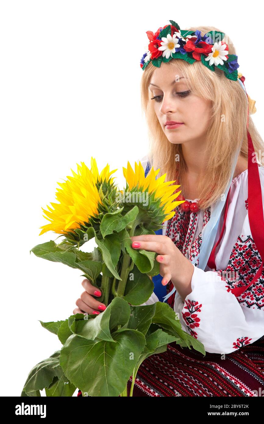 Woman wears Ukrainian dress is holding a sunflower Stock Photo Alamy